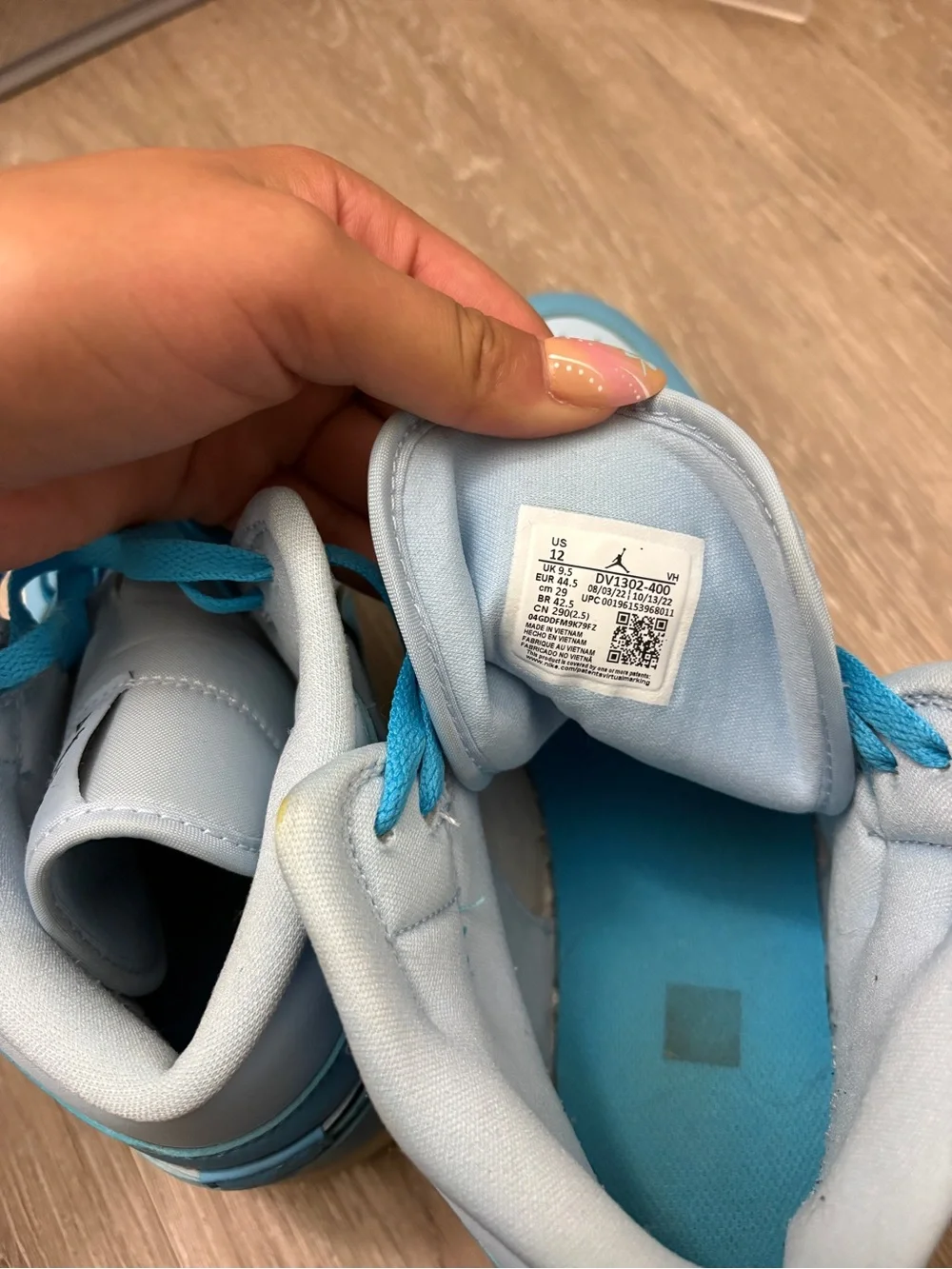Nike Light Blue and White mid Sneakers